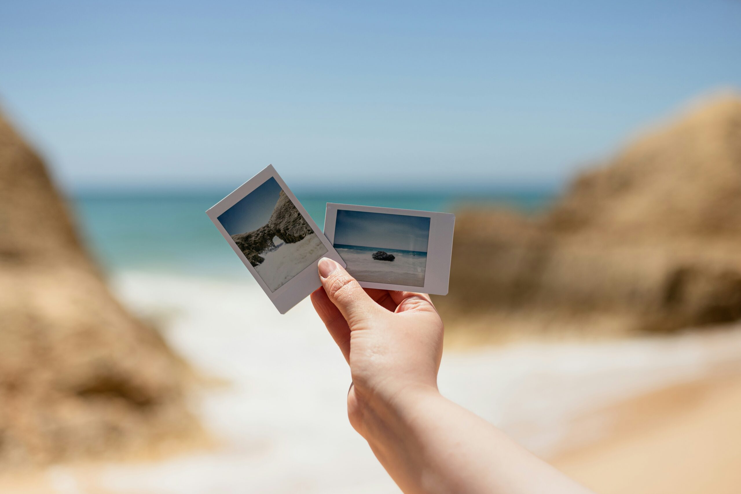 Fotos impressas na frente da praia.
