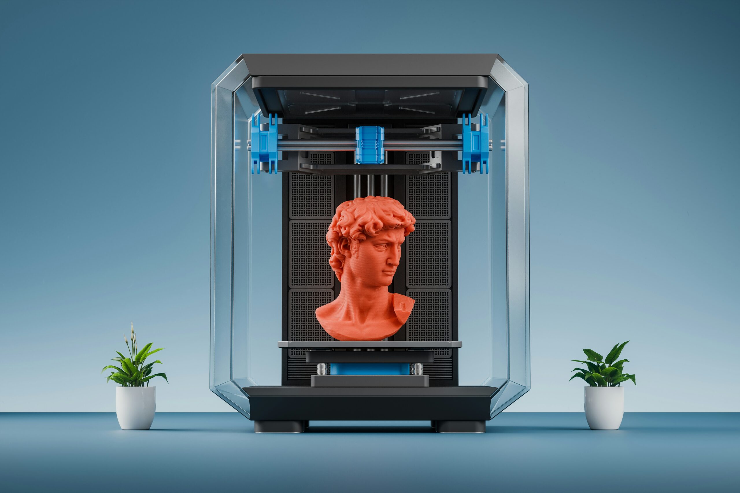 Uma impressora 3D imprimindo uma escultura vermelha em um fundo azul.